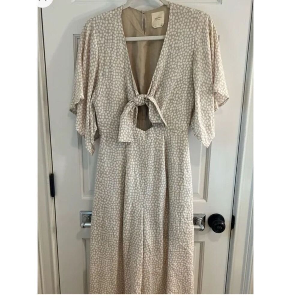 Cream Printed Tie-Front Jumpsuit with Flutter Sleeves